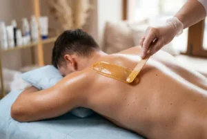 "Professional back waxing treatment for men at a waxing salon in Erie, Colorado."